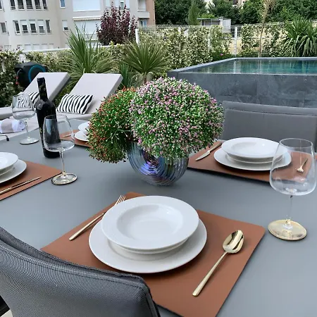 Sea Front Luxury With A Private Infinity Pool , A Large Garden And A Private Garage On The In Apartment Split