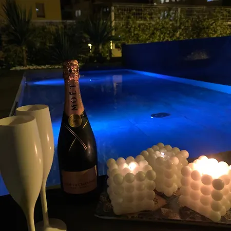 Sea Front Luxury With A Private Infinity Pool , A Large Garden And A Private Garage On The In Apartment